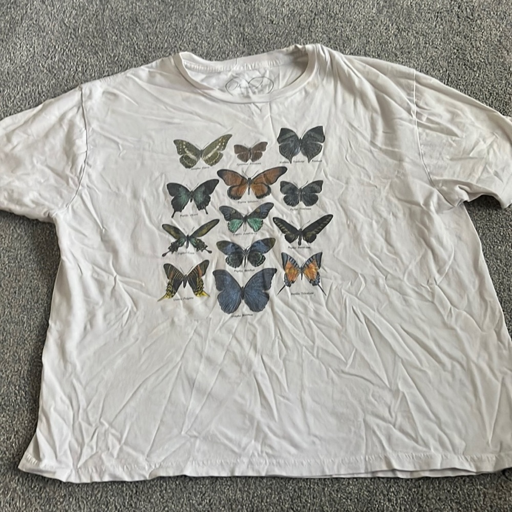 white graphic t shirt with butterfly's